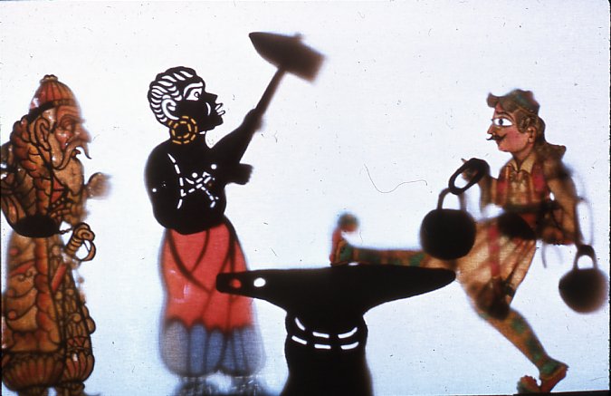 The Turks' gypsy hangman on the point of giving the Greek hero a new walking style in a scene from a Greek shadow puppet play (<a href='http://www.britishmuseum.org/research/search_the_collection_database/search_object_details.aspx?objectid=3291073&partid=1&fromADBC=ad&toADBC=ad&titleSubject=on&physicalAttribute=on&numpages=10&images=on&orig=%2fresearch%2fsearch_the_collection_database.aspx&currentPage=6'>British Museum</a>). An Ottoman custom? A Barcelona cop tells me that his Algerian colleagues stamp on the ankles of bagsnatchers, making them easier to identify and capture next time.