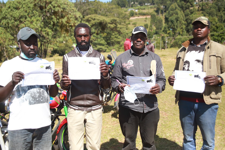 Boda boda riders' elected officials led by chairman Berbard Kibichii (2nd left) in Kabarnet on Thursday.