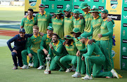 South Africa players pose with the ODI series winners trophy.