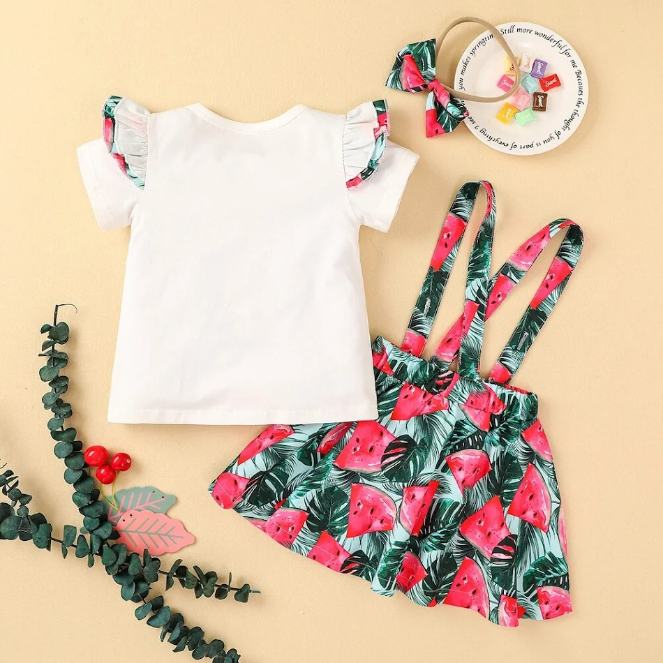 Conjunto de saia com estampa de desenho animado para meninas, primavera e verão. Terno de saia de comércio exterior, ideal para um visual alegre e fresco.