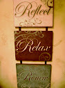 reflect, relax, revive sign.
