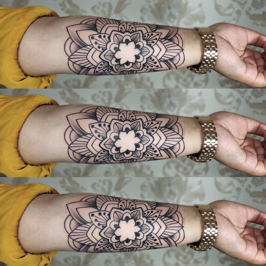 matching mandala tattoos on wrist