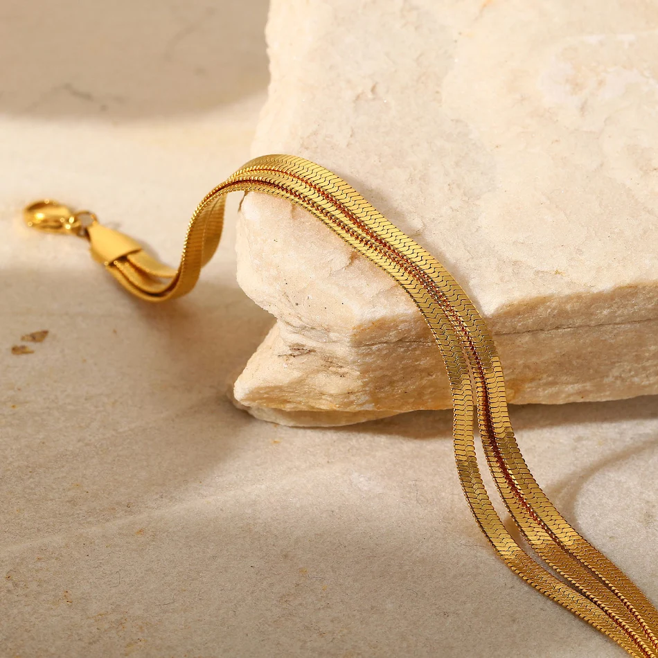 Bracelet chaîne d'os en acier inoxydable empilable Bijoux pour femmes Design élégant et moderne Accessoire polyvalent et durable Idéal pour toutes occasions