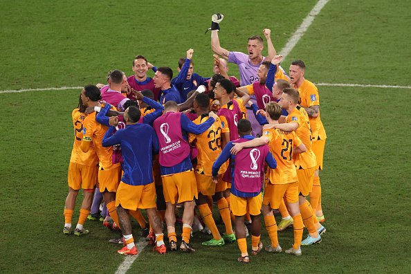 Netherlands players in a huddle after the 3-1 win over USA during the FIFA World Cup Qatar 2022 Round of 16 at Khalifa International Stadium on December 03, 2022 in Doha, Qatar.