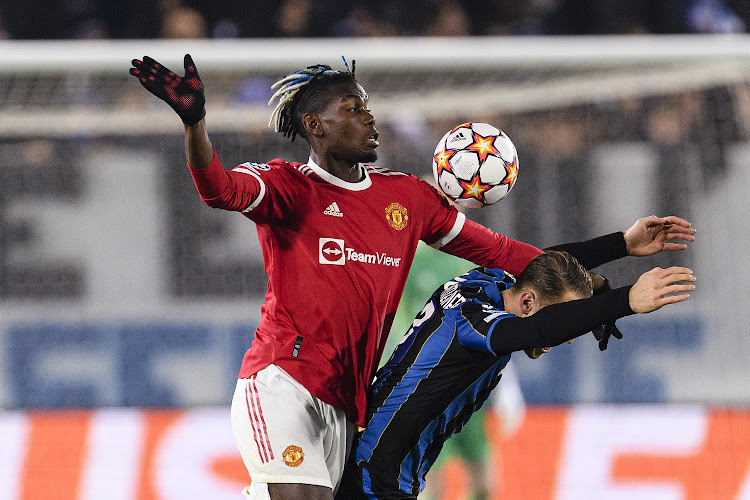 Paul Pogba of Manchester United (left) battles for the ball with Teun Koopmeiners of Atalanta in the Uefa Champions League group F match at Stadio di Bergamo in Bergamo, Italy on November 2 2021.