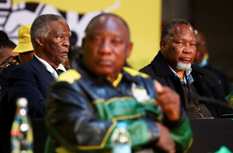 Former South African Presidents Thabo Mbeki and Kgalema Motlanthe and current President Cyril Ramaphosa look on during the African National Congress (ANC) national policy conference at the Nasrec Expo Centre in Johannesburg.