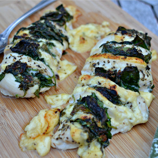 This super simple Hasselback Chicken is made flavorful with Gouda cheese and fresh baby spinach. The spinach helps keep the chicken moist while the Gouda and the herbs infuse flavor. 