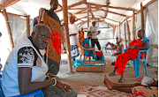 James Tot Joak, left, a mobile health supervisor in Thonyor, treated patients in the swamps of the White Nile during the civil war and came back to help rebuild the health facility.