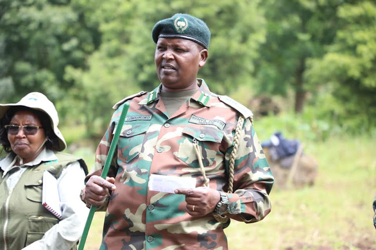 Chief Conservator of Forest Alex Lemarkoko addressing KFS staff and the community forest association members at Matathia block of Uplands forest in Lari constiteuncy in Kiambu county.