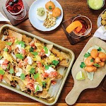 EXPATRIATE’S NACHOS was pinched from <a href="http://liquor.com/articles/bar-food-wonton-nachos/" target="_blank">liquor.com.</a>
