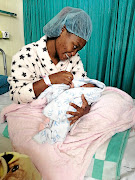 Bikokuhle Hlatshwayo at Chris Hani Baragwath Hospital with her  baby Mpumelelo after she was found unharmed.