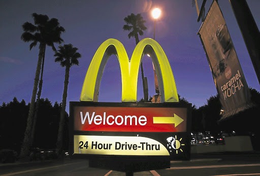 A McDonald's restaurant sign lures night owls in Los Angeles.