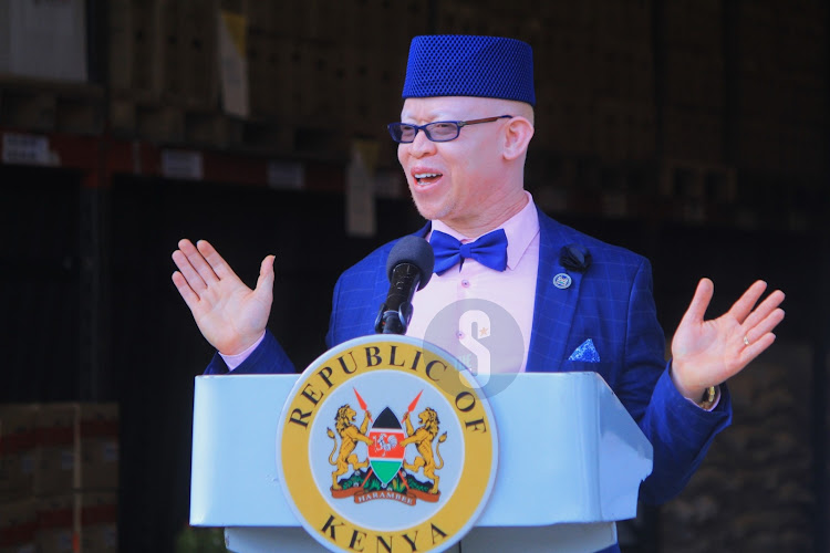 Government Spokesman Isaac Mwaura addresses the press at the Kenya Redcross warehouses in Nairobi south c area on December 19, 2023.