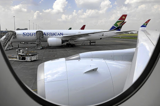 An SAA aircraft at OR Tambo International Airport in Johannesburg . The embattled airline cancelled a number of flights this week./Sumaya Hisham / REUTERS