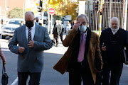 Anton Pretorius and Willem Coetzee with their legal team after their court case for the murder of uMkhonto weSizwe operative Nokuthula Simelane was postponed to August 23 at the high court in Pretoria on Monday.