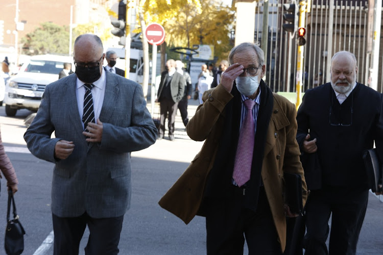 Anton Pretorius and Willem Coetzee with their legal team after their court case for the murder of uMkhonto weSizwe operative Nokuthula Simelane was postponed to August 23 at the high court in Pretoria on Monday.