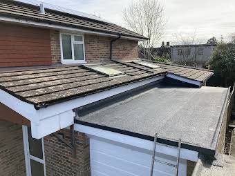 De-Moss main Roof and renew flat roof.  album cover