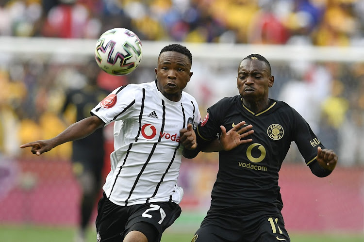 Paseka Mako of Orlando Pirates and Khama Billiat of Kaizer Chiefs during the Absa Premiership match between Orlando Pirates and Kaizer Chiefs at FNB Stadium on February 29, 2020 in Johannesburg, South Africa.