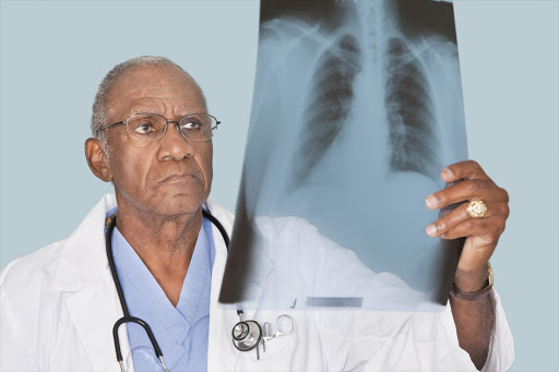 Doctor looking at an x-ray. File photo.