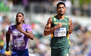 Alex Haydock-Wilson of Team Great Britain and Wayde van Niekerk of Team SA compete in the men's 400m heats on day three of the World Athletics Championships at Hayward Field in Eugene, Oregon on July 17 2022.