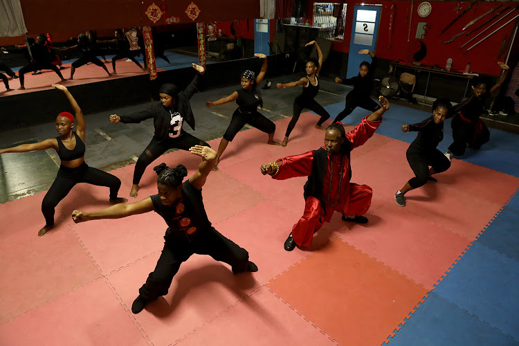 Master Dlamini trains his female class on how to protect themselves against gender-based violence at Black Fox Martial Arts.