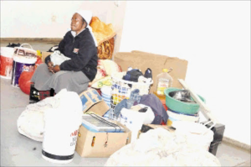 A Zimbabwean Lizy Mhlanga, 39, was evicted from Westernburg, Polokwane in Limpopo because of xenophobic attack. Homeless people are staying at Peter Mokaba stadium dressing rooms. Residents are accusing that Zimbabweans are practicing criminal activities. PIC: ELIJAR MUSHIANA. 08/12/2009. © Sowetan.