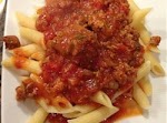 Nana's Slow Cooked Meaty Tomato Sauce was pinched from <a href="http://allrecipes.com/Recipe/Nanas-Slow-Cooked-Meaty-Tomato-Sauce/Detail.aspx" target="_blank">allrecipes.com.</a>