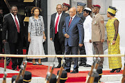 MISFIRING: President Jacob Zuma steals a photo opportunity before a 21-gun salute at the State of the Nation address in parliament last week