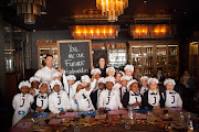 Chef Shane Smit and the children who were part of the healthy eating workshop Picture: Supplied