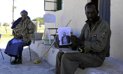 Maria Kepadire and Themba Dlavane speak of the death of Itumeleng Joseph 'Oupa' Dlavane who died while building a pit toilet at Bodibe village outside Mafikeng. /Tiro Ramatlhatse