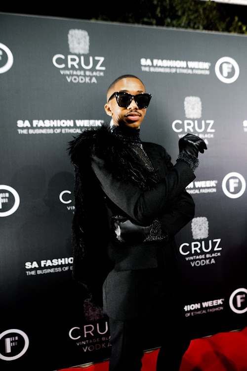 Media personality Lasize Dambuza at the SAFW opening party red carpet.