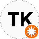 T K