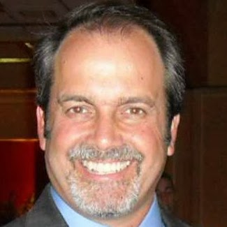Tim Hughes