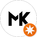 M K