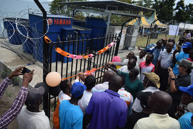 MP Caroli Omondi, officers and residents during the opening of Uterere water project in Suba South constituency on March 20,2024