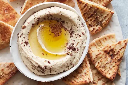 Pita Bread With Hummus And Lebanese Gherkins