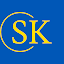 S K