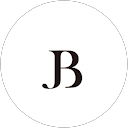 J B