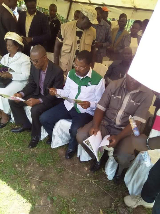 Ford Kenya leader Moses Wetangula and secretary general Eseli Simiyu during a funeral on Saturday in Tongaren