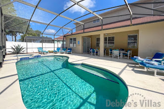 Sun-drenched south-facing pool deck at this Davenport vacation villa