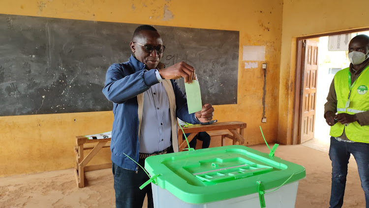 UDA candidate for Kitui Rural parliamentary seat Charles Nyamai casts his vote at Kanyangi Primary school Polling Station on Monday.