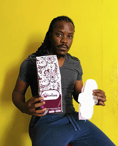 Betusile Mcinga shows the brand of sanitary pads he co-founded to help girls to not miss school when on their periods