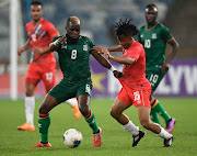 Saddam Phiri of Zambia challenges Marcela Papama of Namibia in the 2022 Cosafa Cup final at Moses Mabhida Stadium in Durban on July 17.