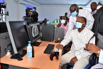 Health CS Mutahi Kagwe goes through an interactive session with doctors from different countries at KNH on March 22, 2020.