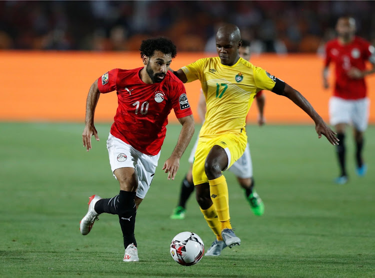 Egypt's Mohamed Salah in action with Zimbabwe's Knowledge Musona.
