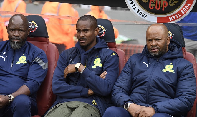 Mamelodi Sundowns head coach Rhulani Mokwena, centre, with first-team coach Steve Komphela, left, and senior coach Manqoba Mngqithi.