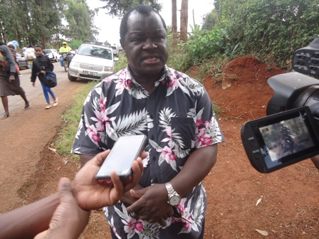 Former PS Cyrus Njiru speaking to the press at Kibugu Shopping Centre in Embu North at a past function.