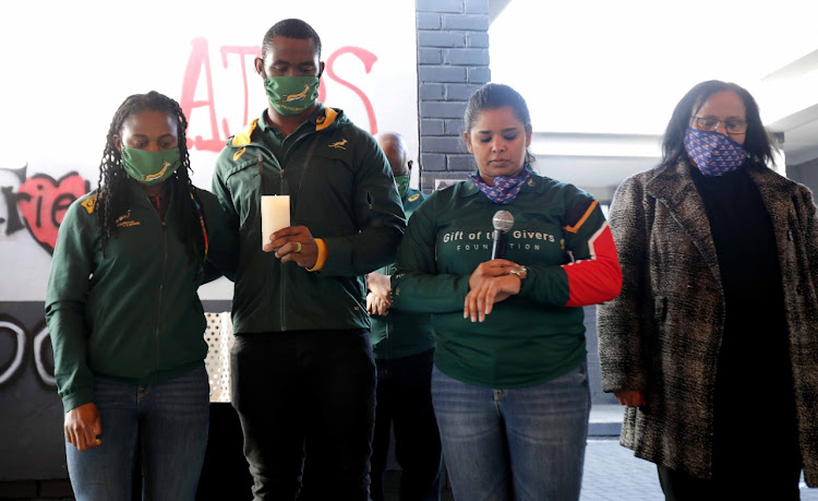 Springbok captain Siya Kolisi observes a moment of silence for victims of GBV at Peak View Secondary School in Athlone, Cape Town, on Thursday.