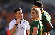 Referee Paul Williams talks to Faf de Klerk of the Springboks during the Rugby Championship match against the Wallabies at Adelaide Oval on August 27 2022.