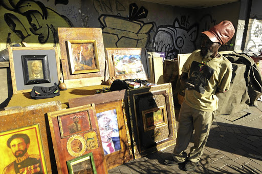 Thomas Bika creates artworks and picture frames to sell so that he can sustain himself.